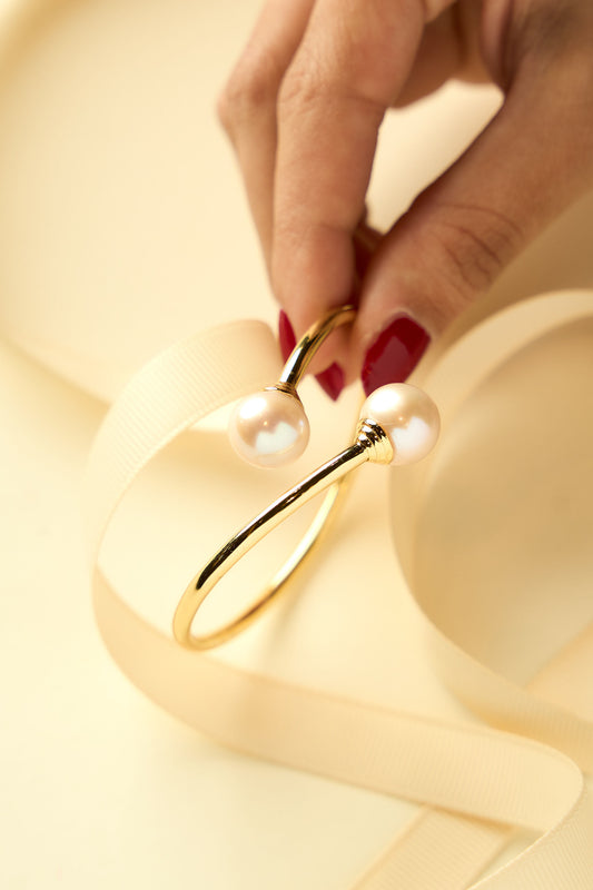 Pulsera en plata bañada en oro y con perla