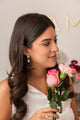 Aretes en plata bañado en oro y con larimar